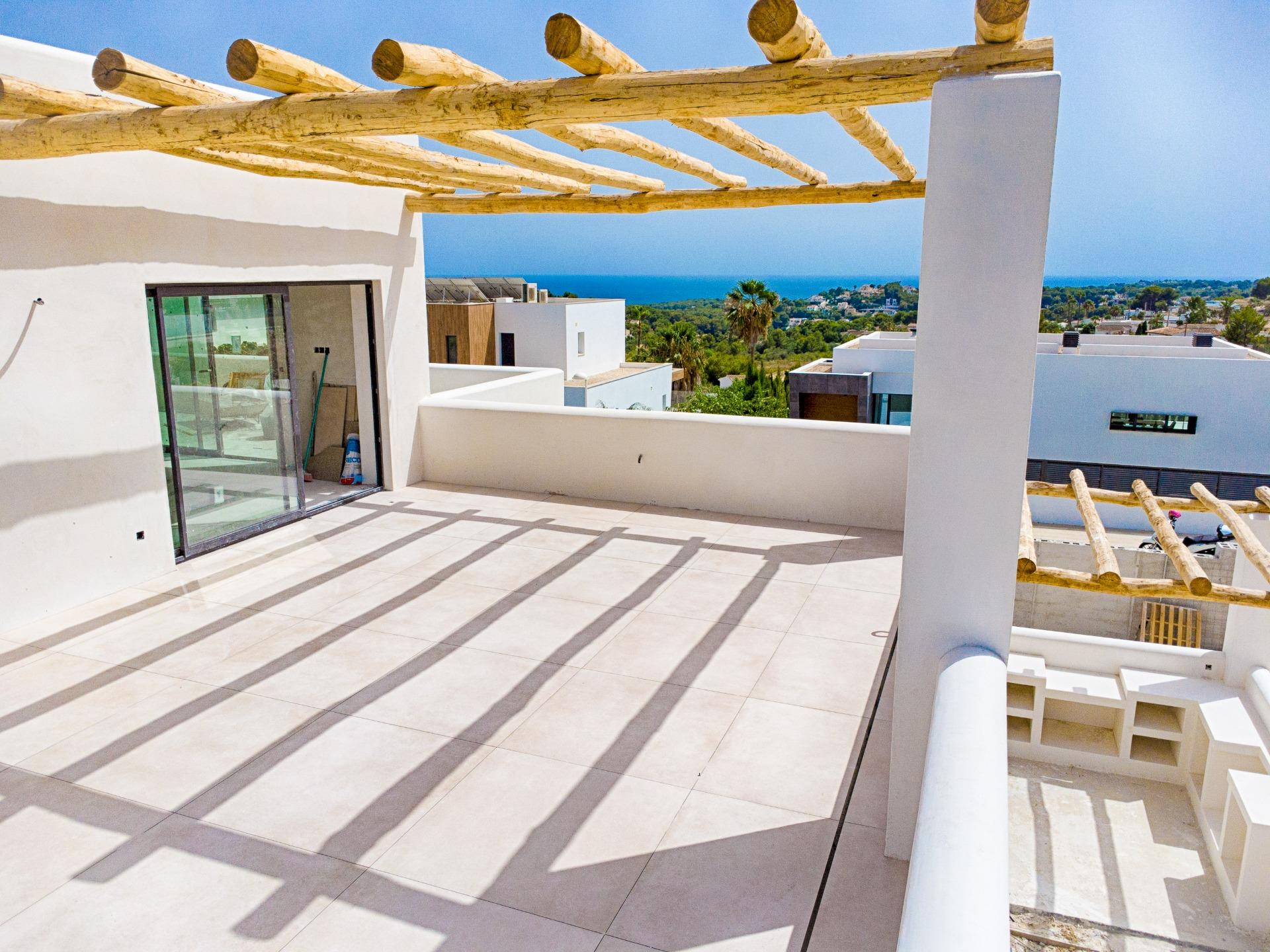 Villa moderna estilo ibiza en Moraira con vistas al mar a la venta